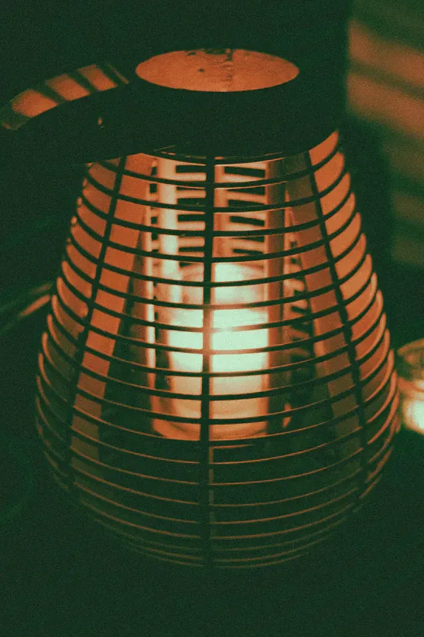 An LED lantern lighting a kitchen during a power outage, an off-grid blackout and emergency backup lighting scene